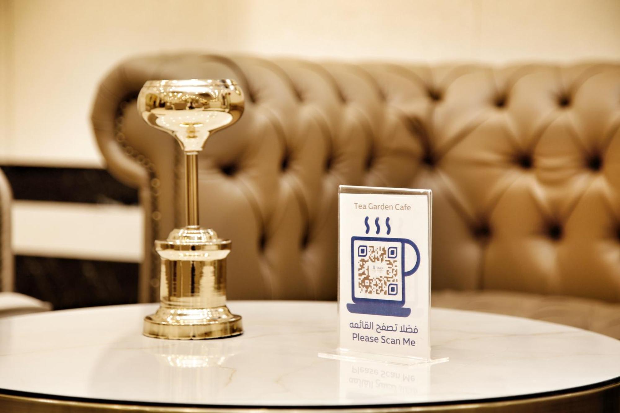 Maden Alrawda Hotell Medina Exteriör bild QR code in a coffee shop
