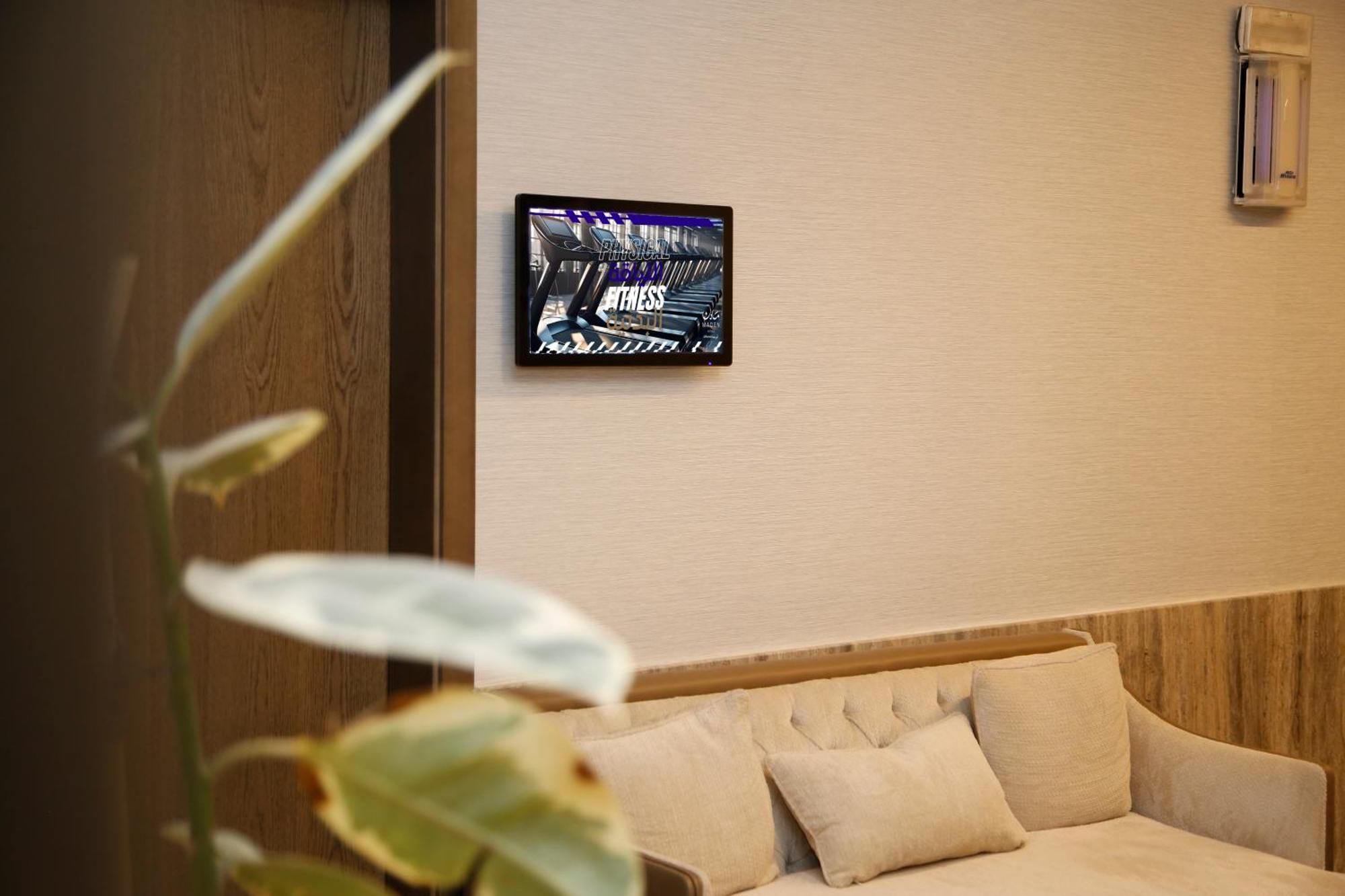Maden Alrawda Hotell Medina Exteriör bild A wall-mounted tablet